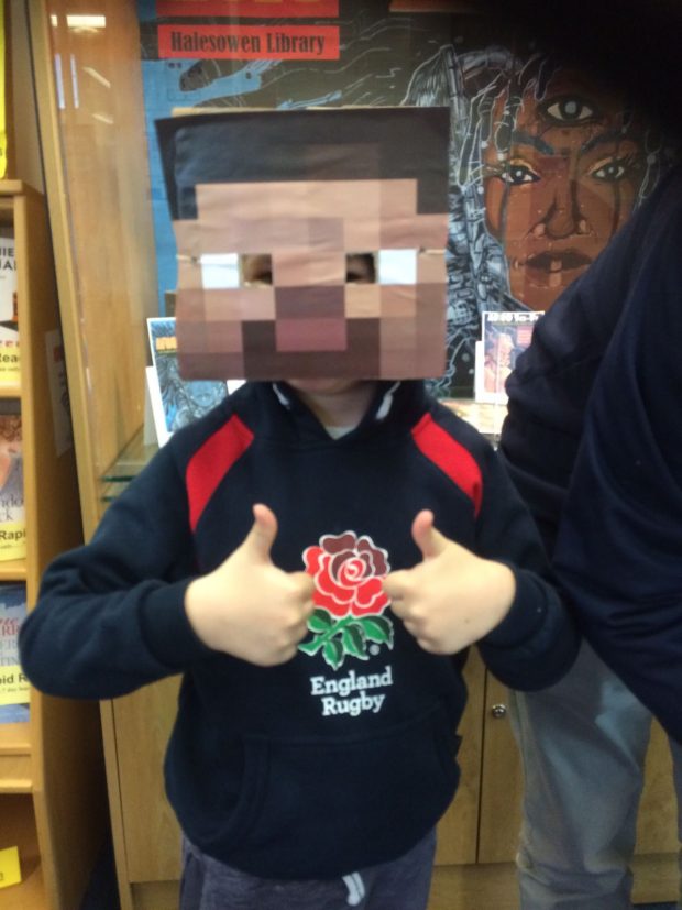 Young minecraft fan in Halesowen library. Photo credit: Dudley libraries