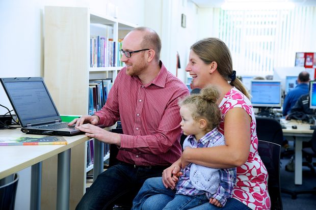 Family surfing the Internet together at South Elmsall Library. Photo copyright: Jill Jennings for Wakefield libraries