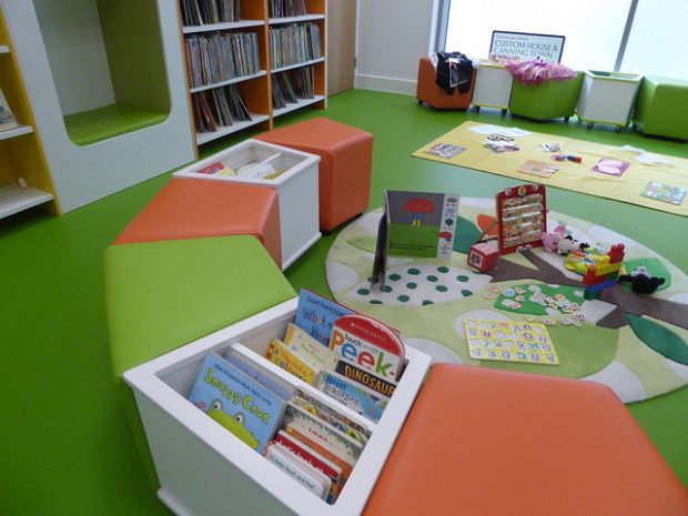 Toys and books await children as the new creche lays out its wares for parents in the children’s library. 