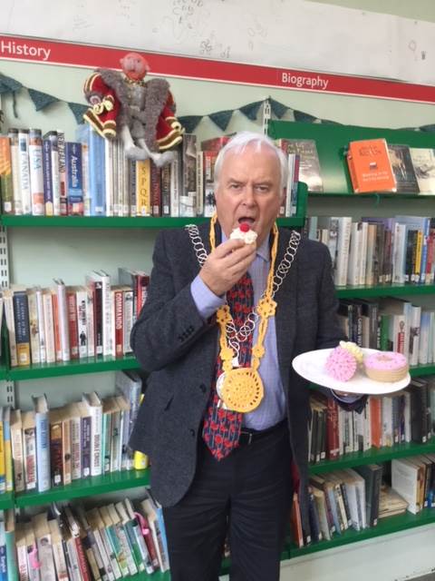 Mayor of Tetbury, complete with knitted chain of office and cakes.