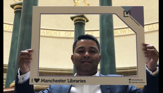 Cllr Rahman in the reading room in Central Library.