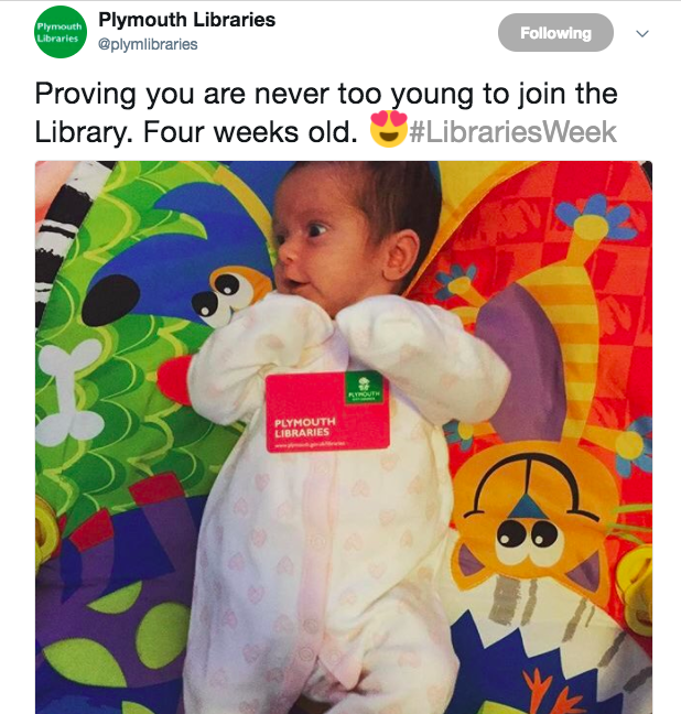 screenshot of tweet showing baby with library card